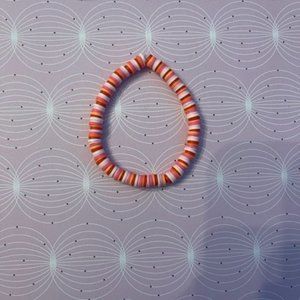 Pink, orange, and white bracelet